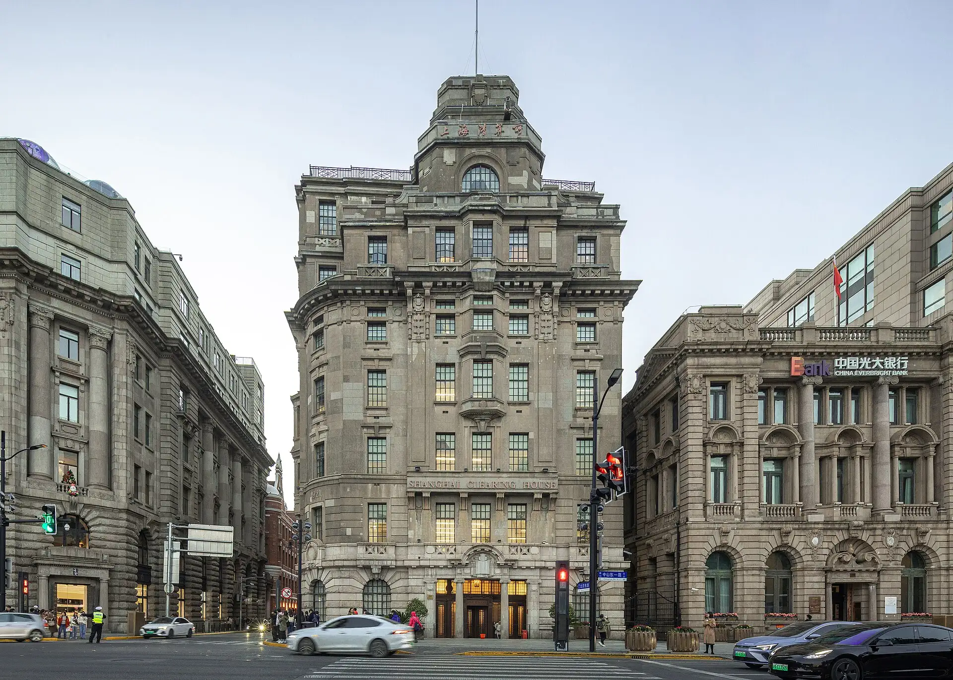 The Glen Line Building on the corner of the Bund and Beijing Road, a grey stone block with a small tower.