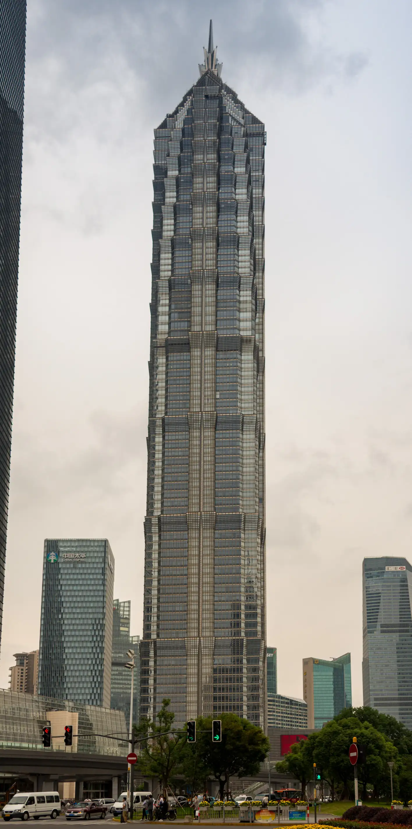 Jin Mao Tower's tiered tower rising above Lujiazui streets.